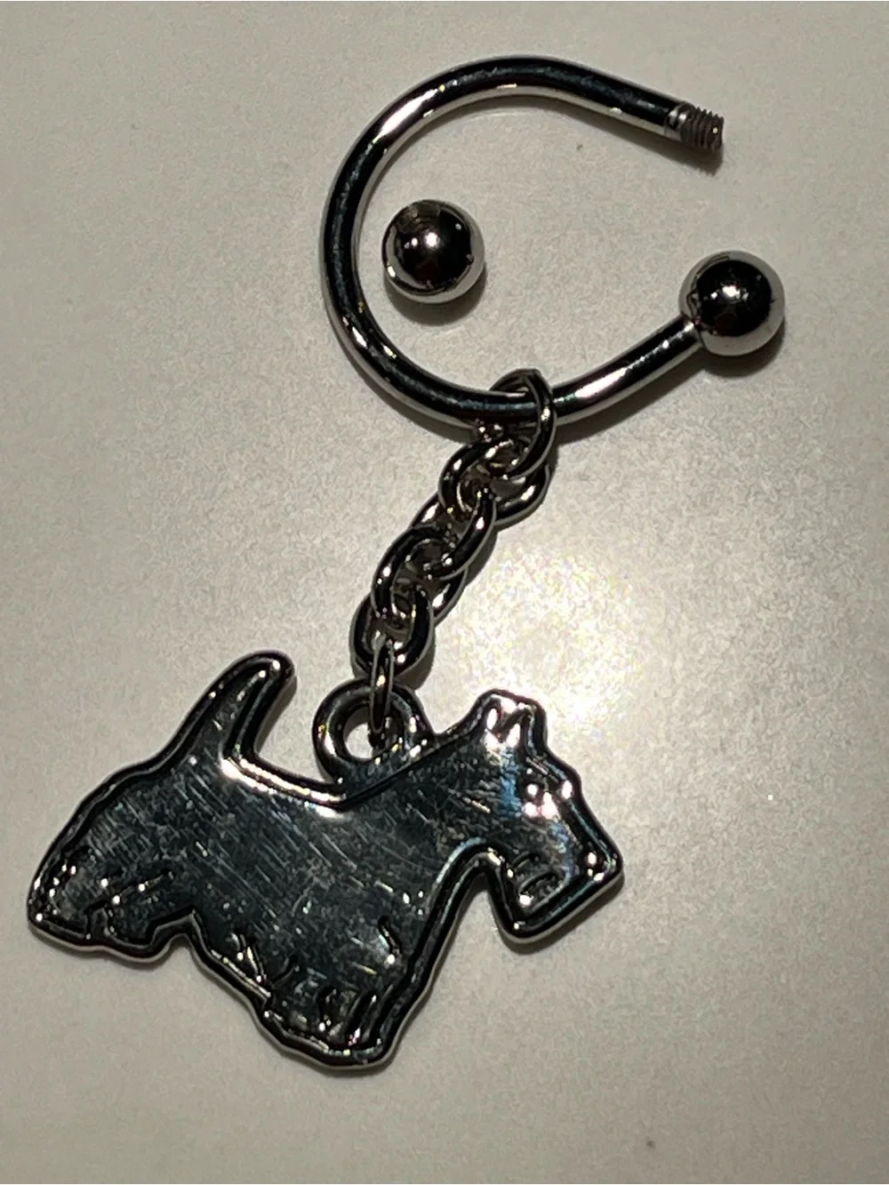 Great silver tone Scottish terrier dog keychain.  Approx 2.5” long.